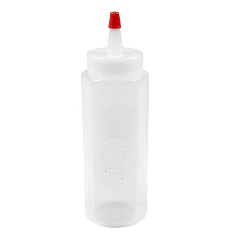 Wilton Regular Melting Squeeze Bottle in use for precise candy piping.