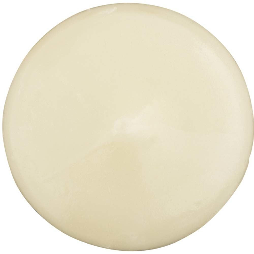 Close-up of Wilton White Candy Melts melting to a creamy texture.