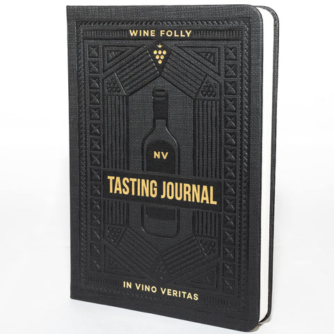 The Wine Folly wine tasting journal cover features premium design for on-the-go notes.