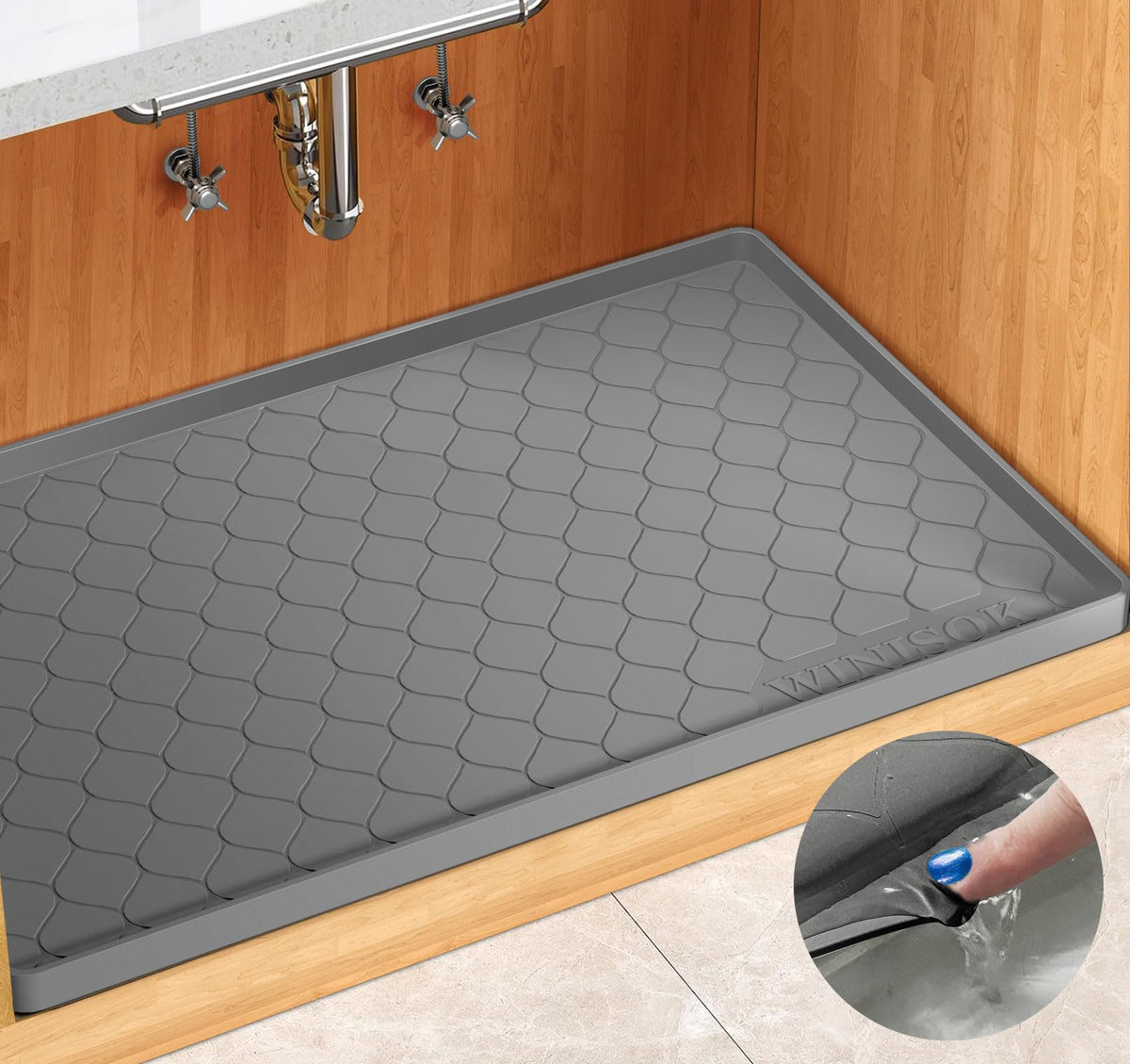Winisok under-sink mat protects cabinets from leaks with a spacious spill-ready surface.