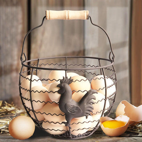 Wire egg basket with wooden handle, vintage charm for easy egg collection.