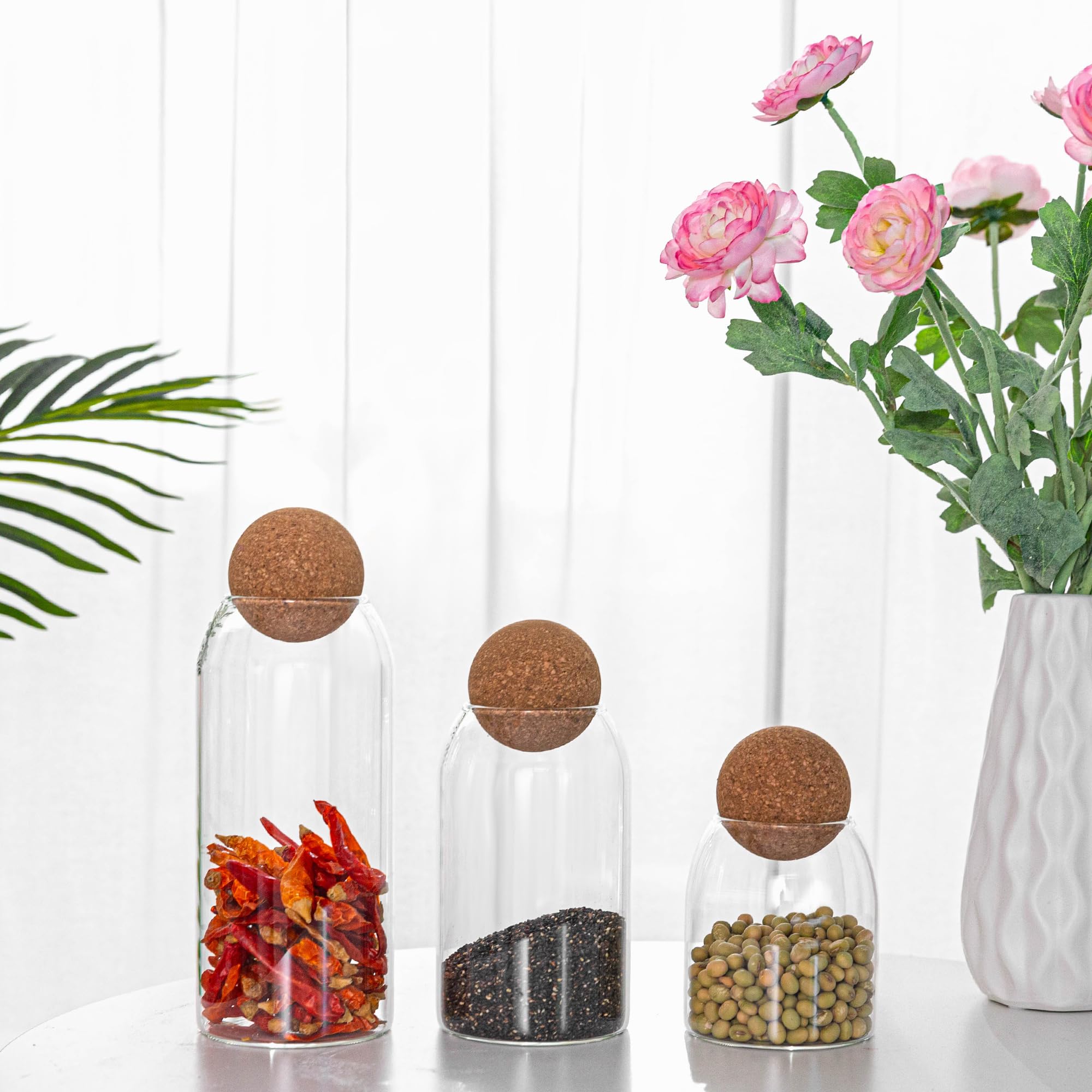 Wisifayardin multiuse glass jar demonstrates spice and nut storage with a stylish lid.