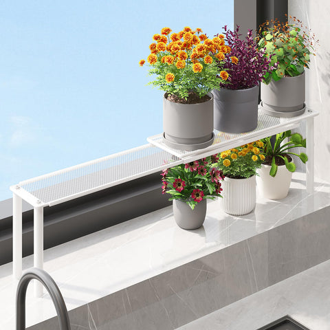 WOCHUANGSI expandable window shelf for plants: ideal for growing compact greenery in sunlit spaces.