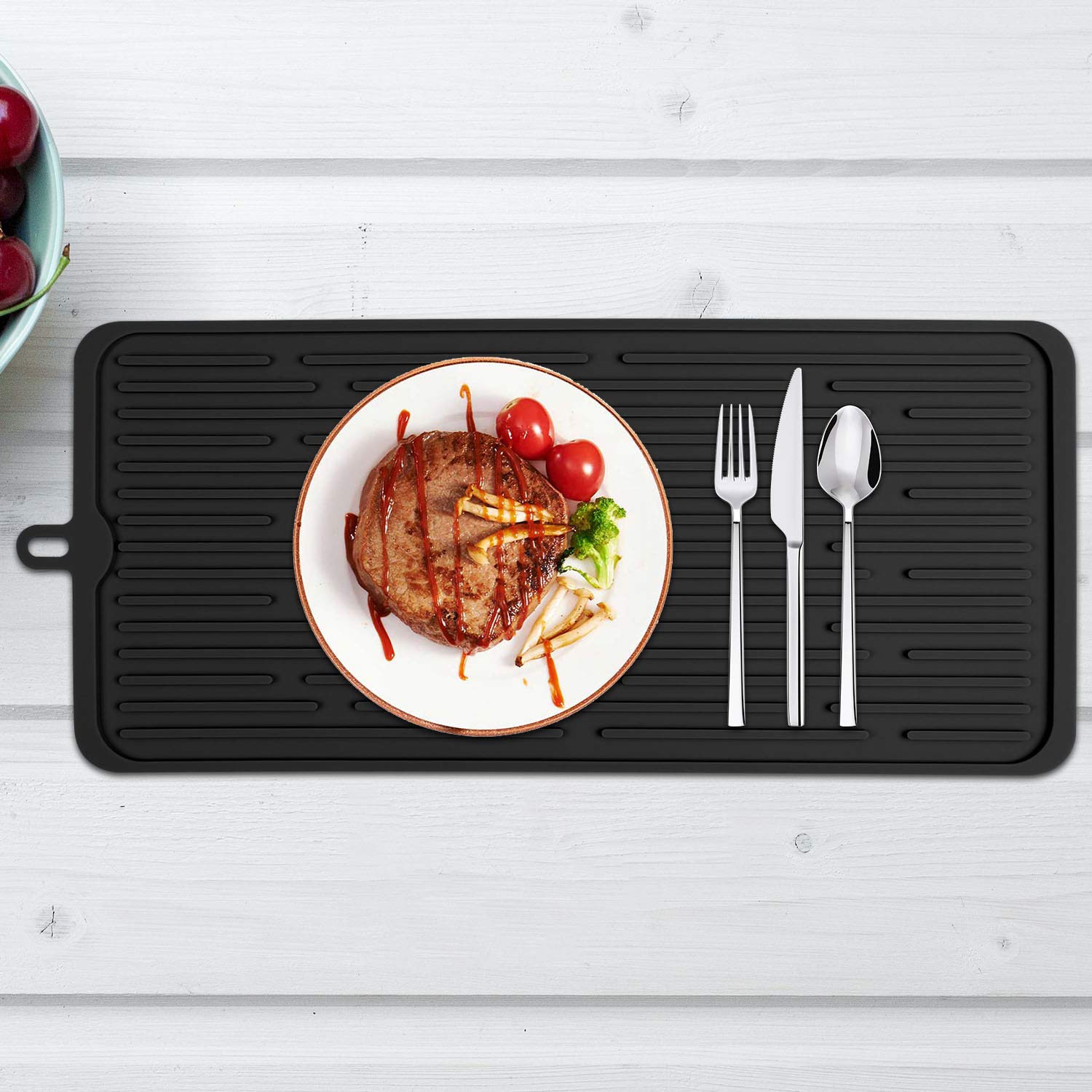 Wonlex silicone dish-drying mat protects countertops and serves as counter accessory.
