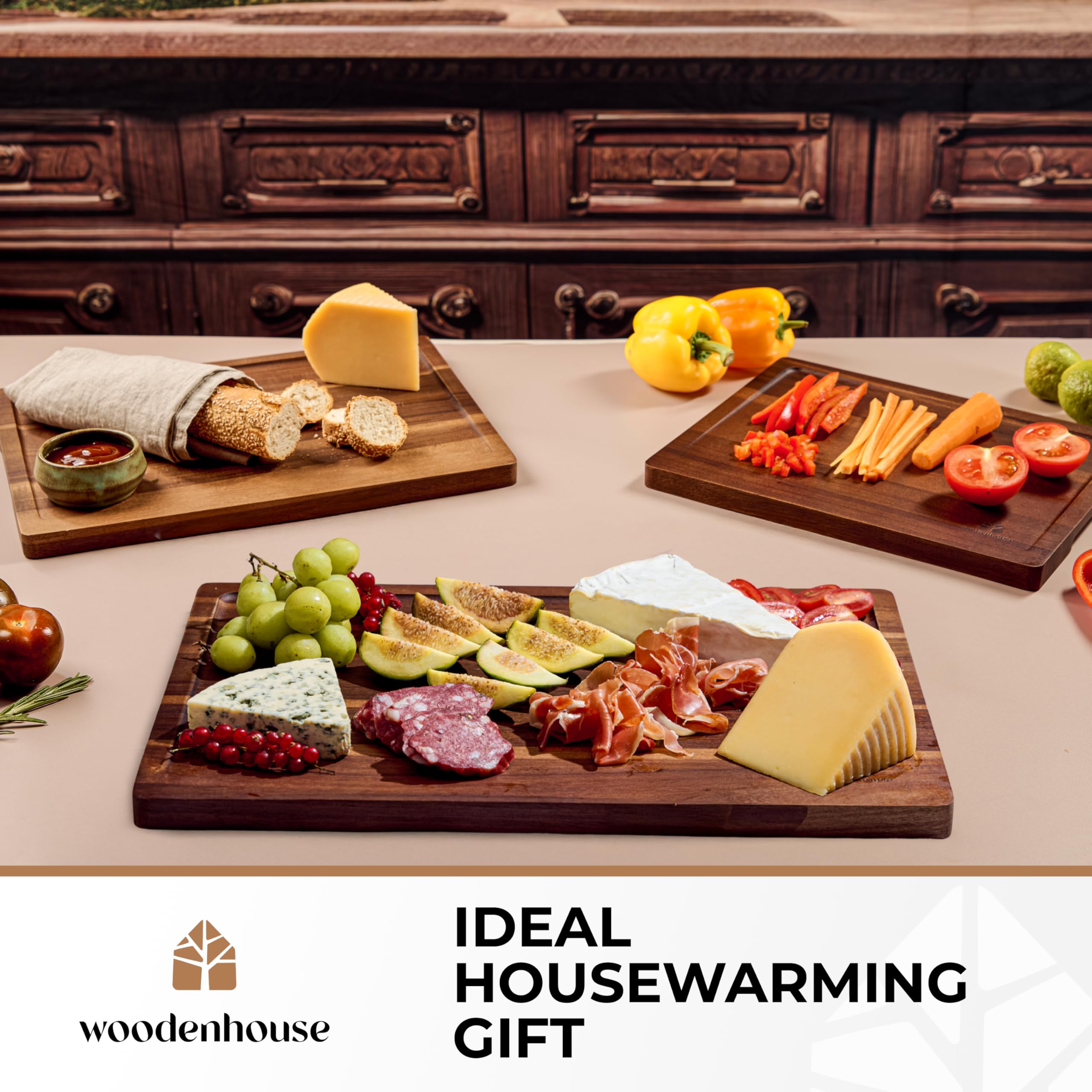 Woodenhouse acacia cutting board with built-in handles for easy transport.