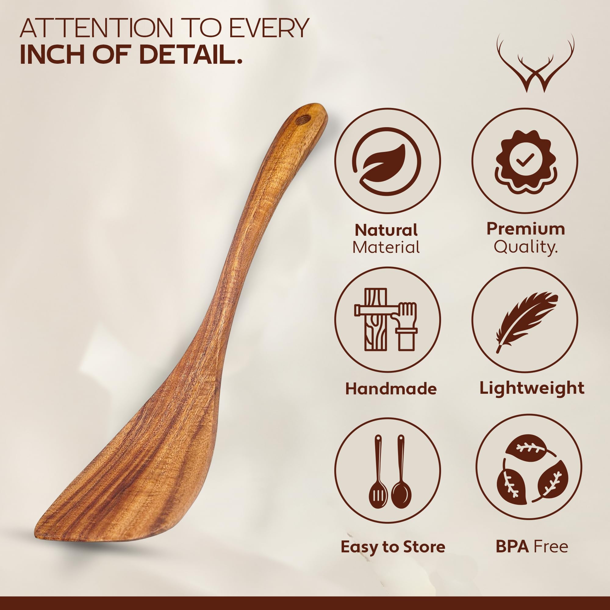 Woodlands USA spatula with ergonomic grip held in hand during cooking