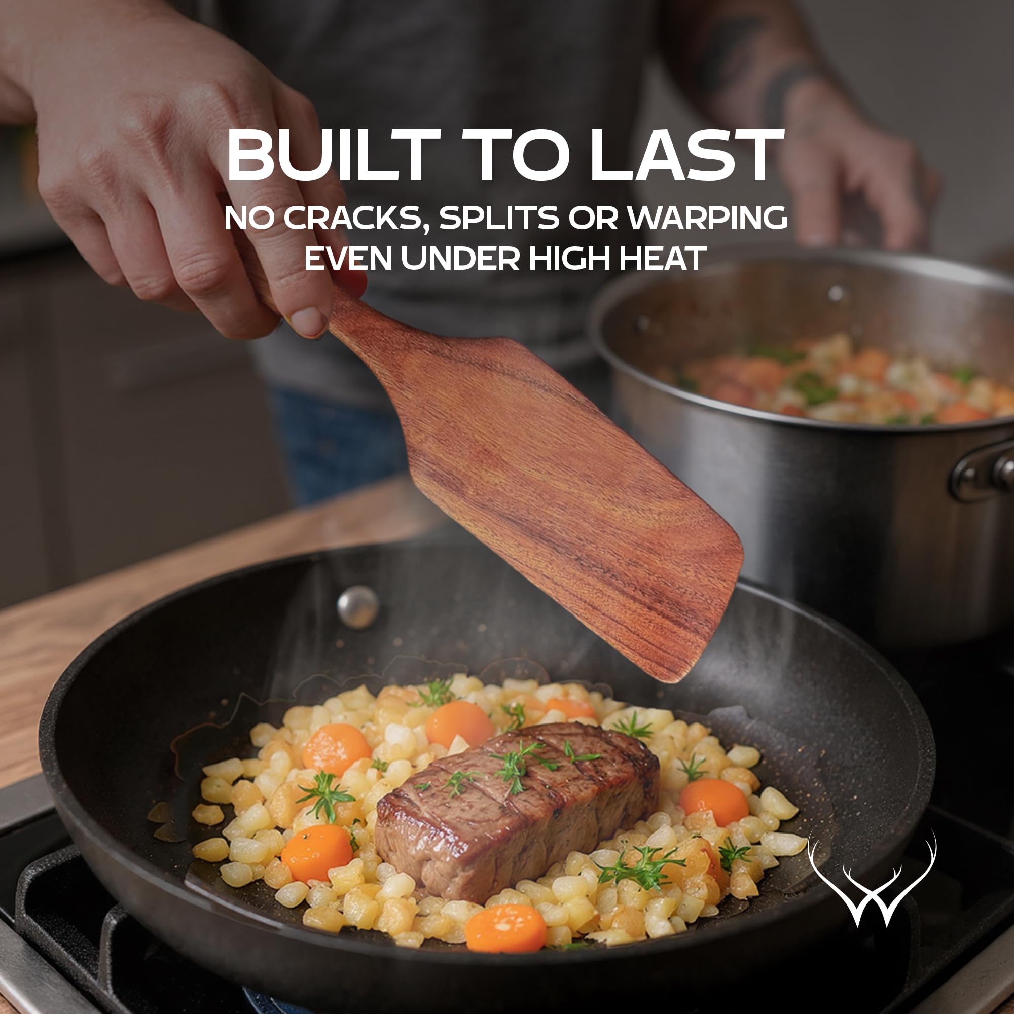 Woodlands USA teak spurtle flat spatula for flipping and stirring.