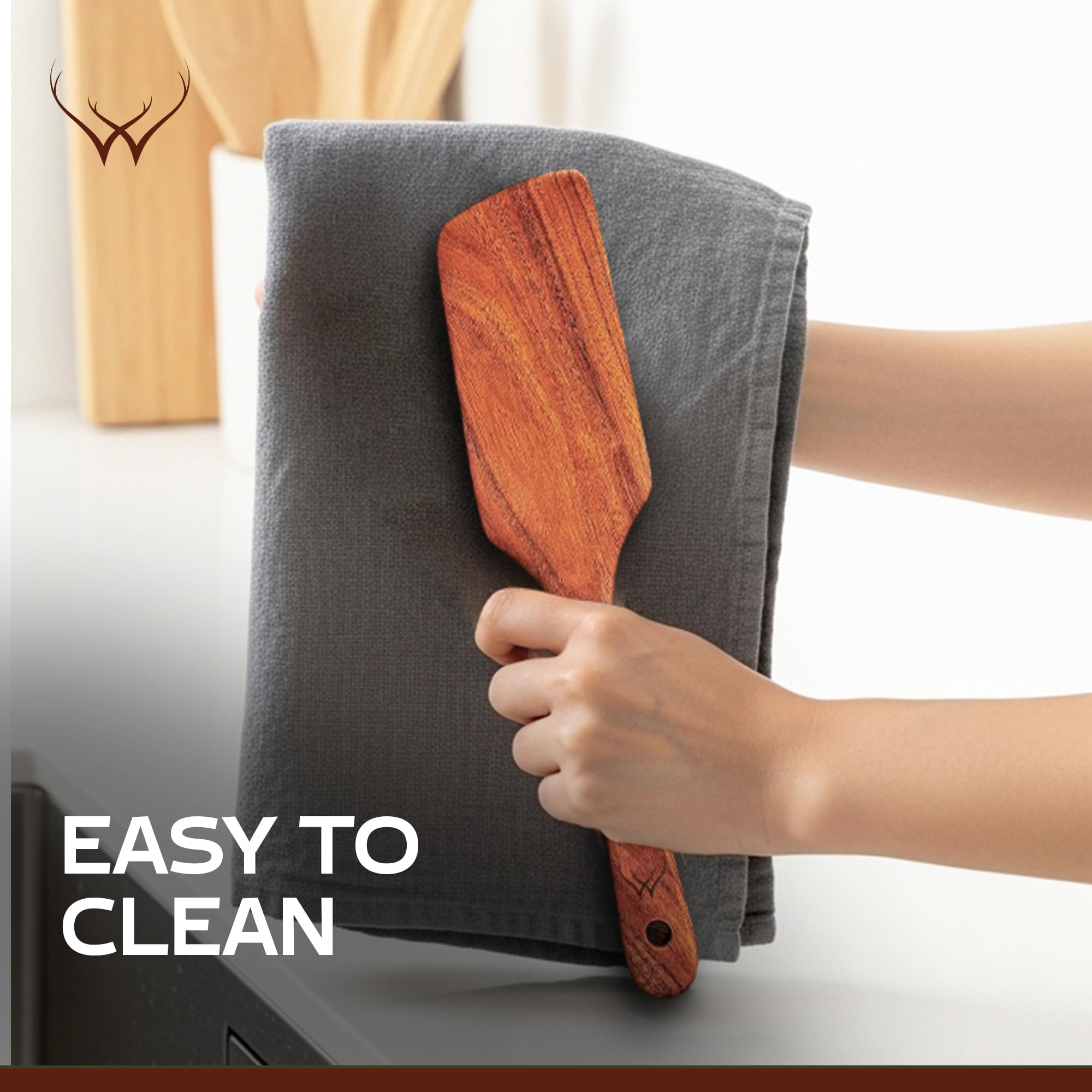 Woodlands USA teak utensil set, five pieces, elegantly packaged for gifting.