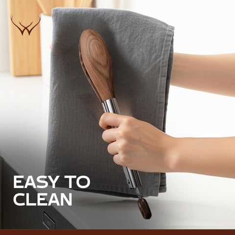 Woodlands USA walnut wooden tongs durable wood built for daily kitchen tasks.