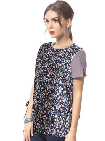 Woonfond Cobbler Apron with dainty floral print, suitable for DIY projects.