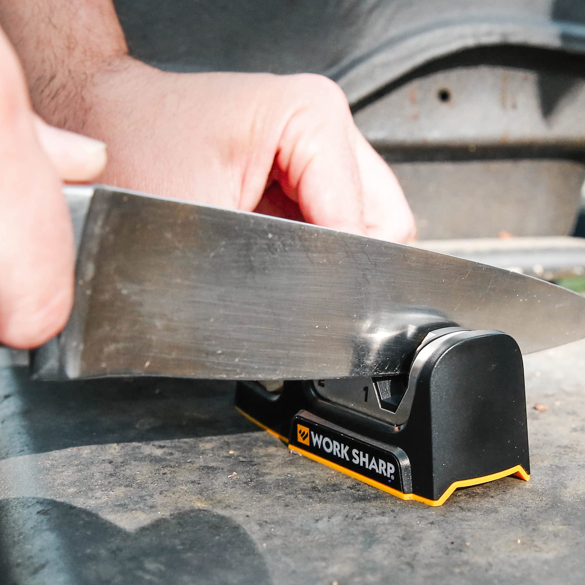 Work Sharp ceramic honing wheel refines edges for daily maintenance.