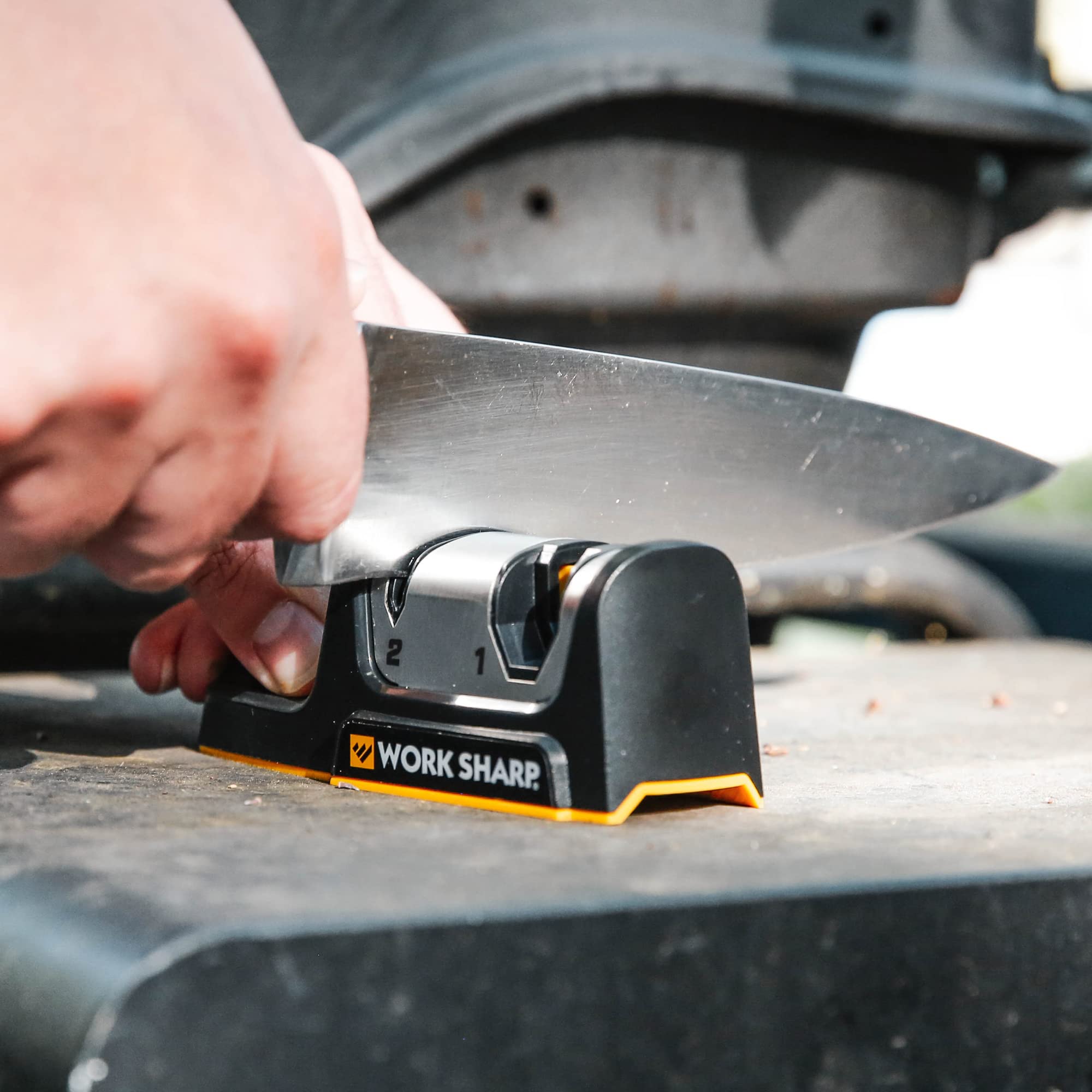 Work Sharp contoured base supports sharpening on countertops.