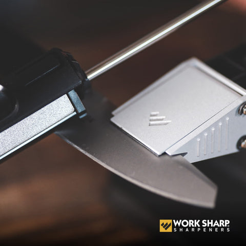 Work Sharp sharpener demonstrating safe, stable grip on a blade