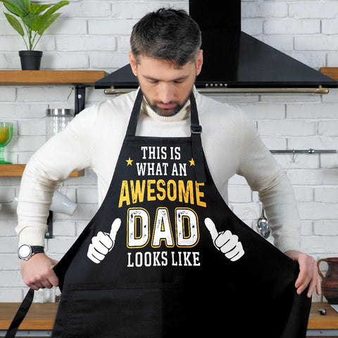 Wrappiness apron showing four front pockets, handy for utensils and phone.