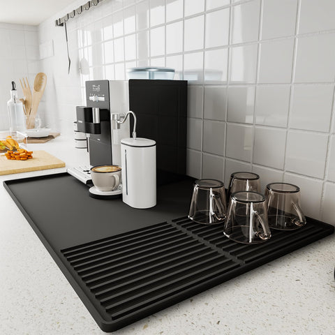 WUDIALIEN silicone coffee mat with raised edge protecting countertops from spills