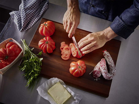 Wüsthof Classic boning knife in a kitchen setting ready for prep tasks.