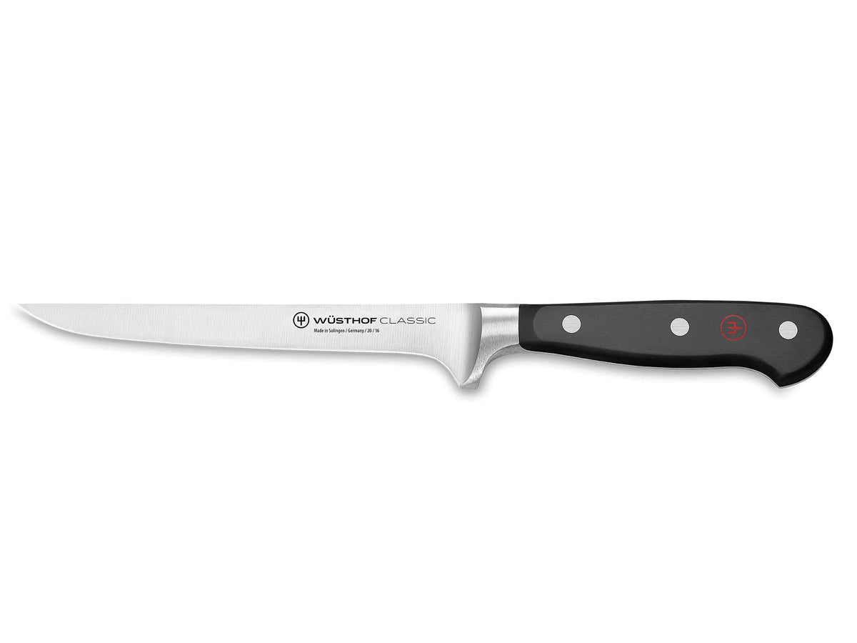 Wüsthof Classic flexible boning knife 6-inch black blade close-up for precise trimming.