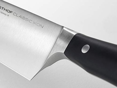 WÜSTHOF Classic IKON 6-Inch Knife double bolster detail for balanced cutting and control.