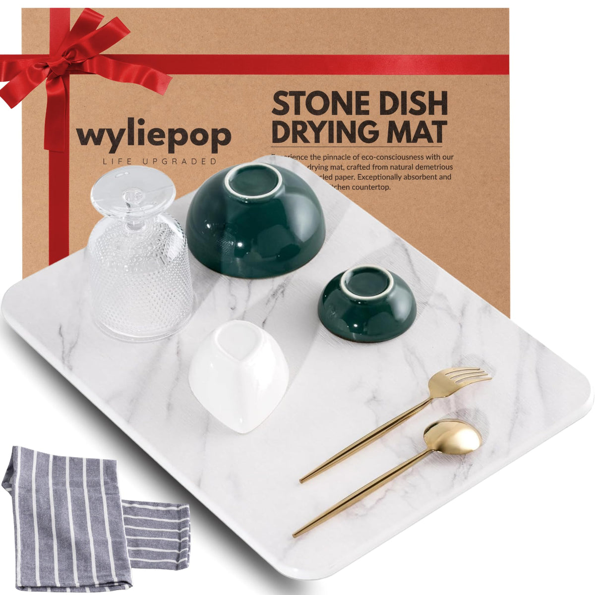 Wyliepop Stone Drying Mat on a kitchen counter demonstrates fast water absorption.