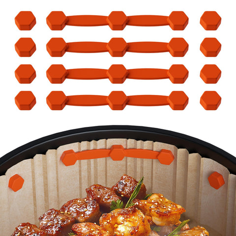 Wynfelo air fryer magnet silicone buckle secures parchment on the basket for safer cooking.