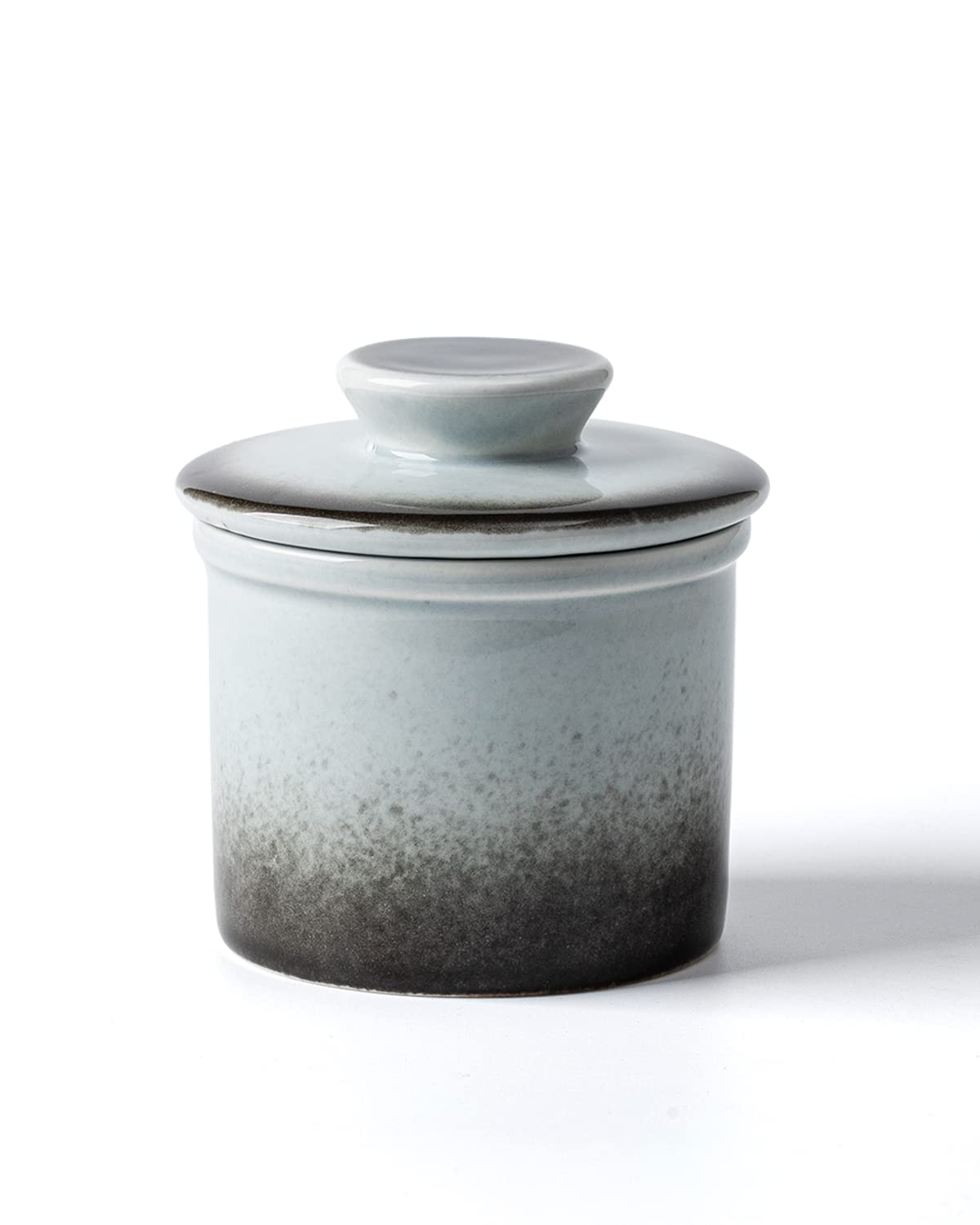 Xela ceramic butter crock on counter preserves spreadable butter.