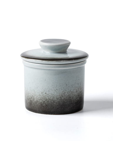 Xela ceramic butter crock on counter preserves spreadable butter.