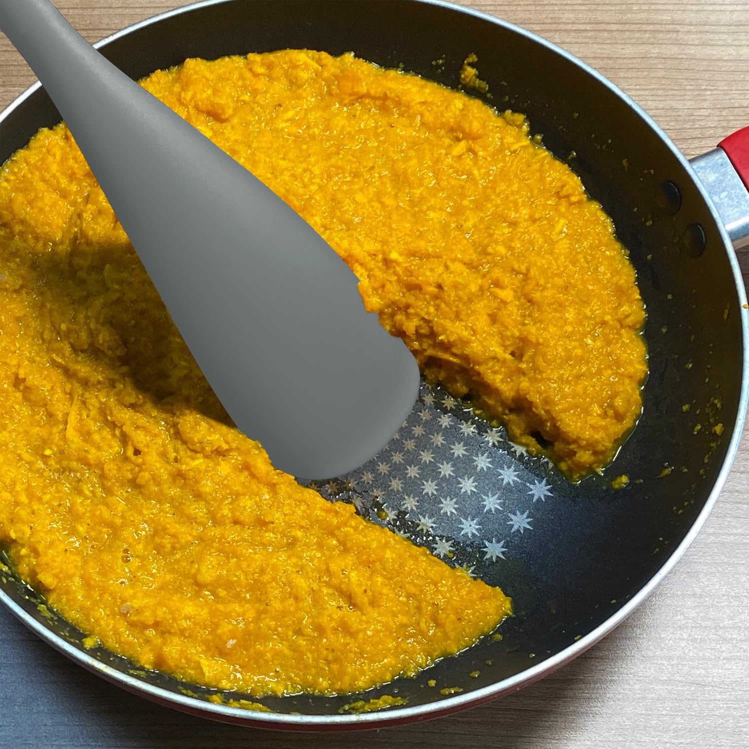 XiaoZu ergonomic gray spatula spoon designed for comfortable stirring and tasting