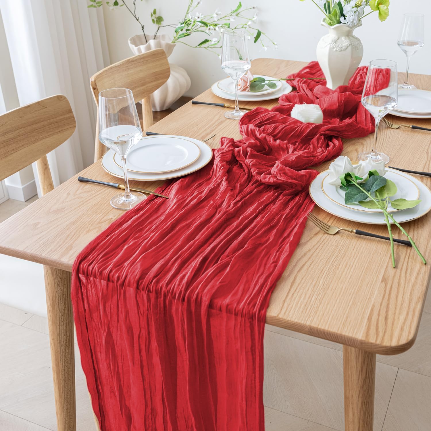 Xiomot table runner with greenery creating an upscale dining scene