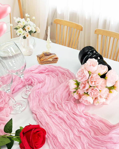 Elegant soft-texture pink runner drapes gracefully for sophisticated tables