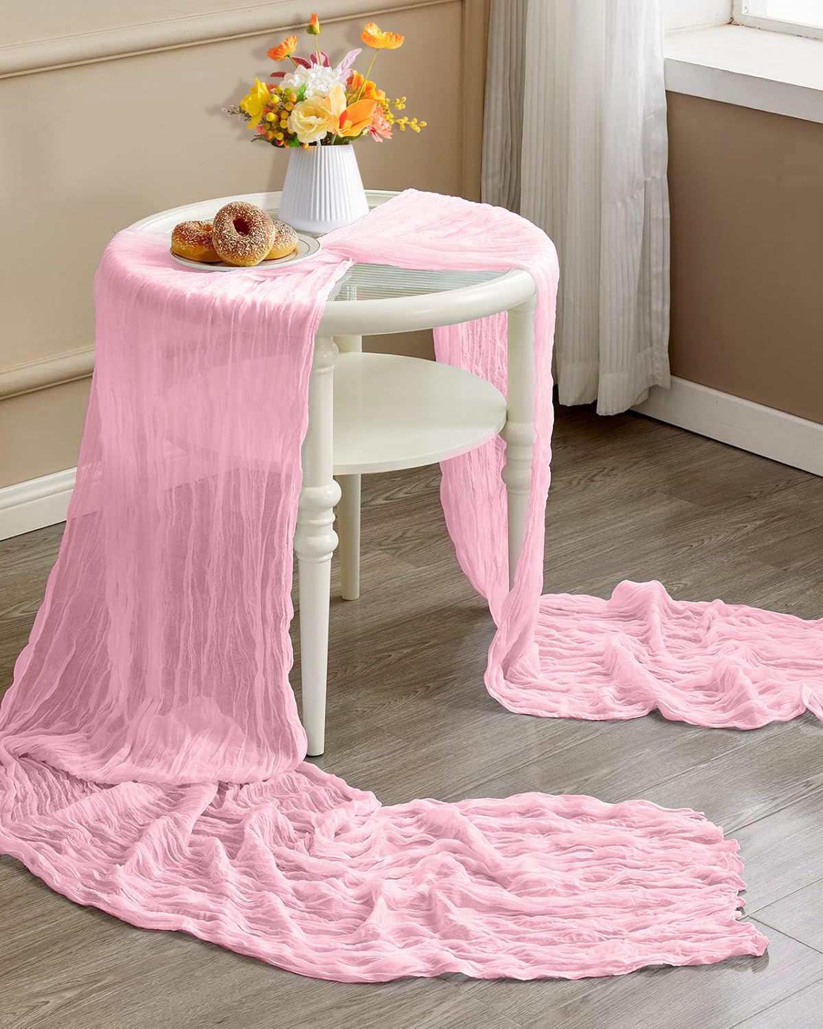 Care and reuse of pink cheesecloth table runner for future events