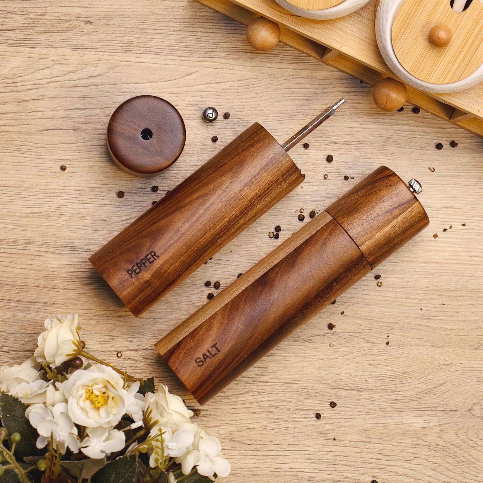 XWXO Acacia grinder with adjustable coarseness dial for customizable textures on demand.