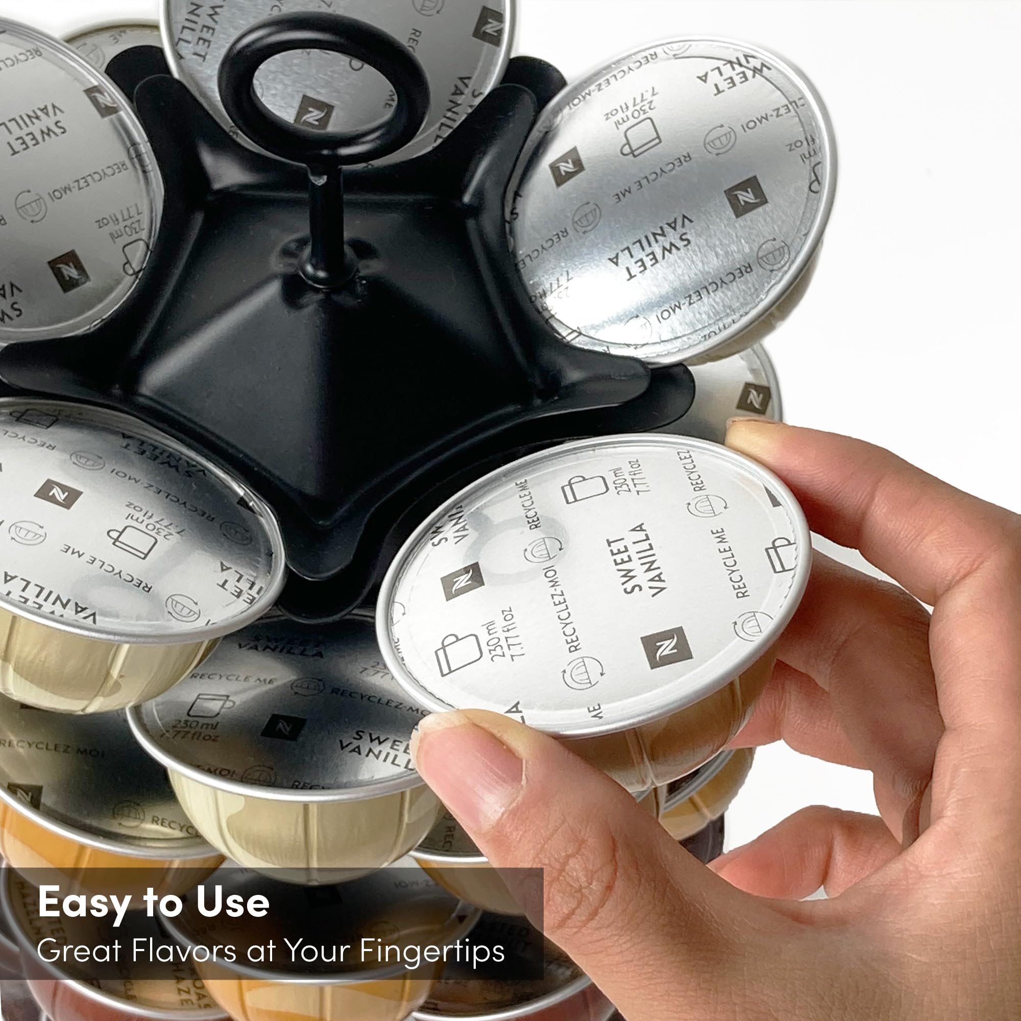 Xympo Vertuo 360 rotating stand demonstrates effortless pod access.