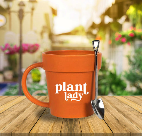 YACO STORE High-quality ceramic mug with stainless steel shovel handle detail.