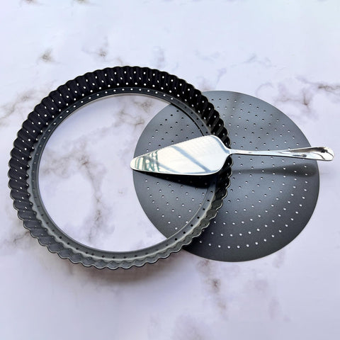 Yamteck 9in perforated tart pan for crispy, even crusts.