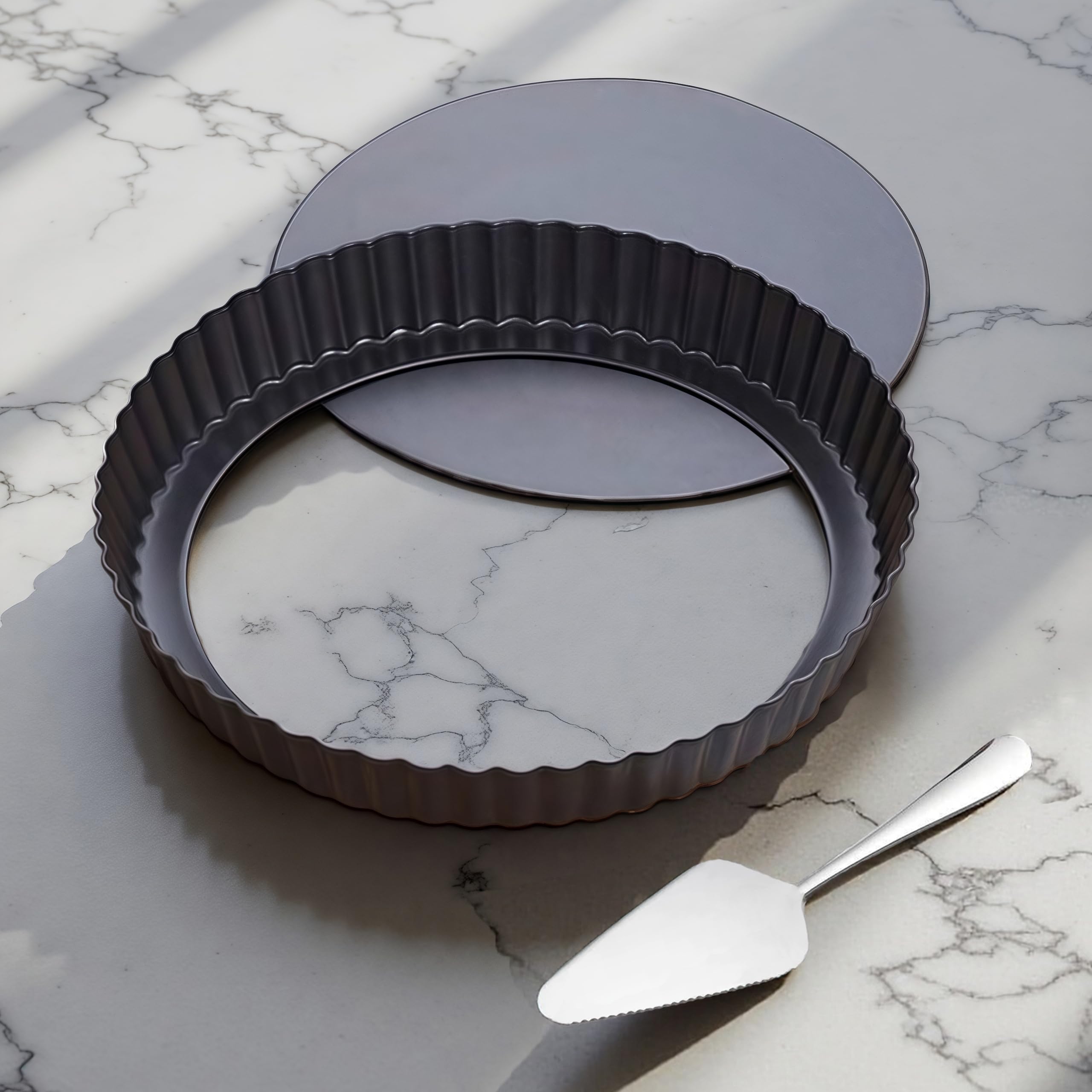 Yamteck 9-inch tart pan with removable bottom for easy demolding and even bake