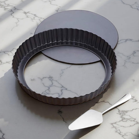 Yamteck 9-inch tart pan with removable bottom for easy demolding and even bake