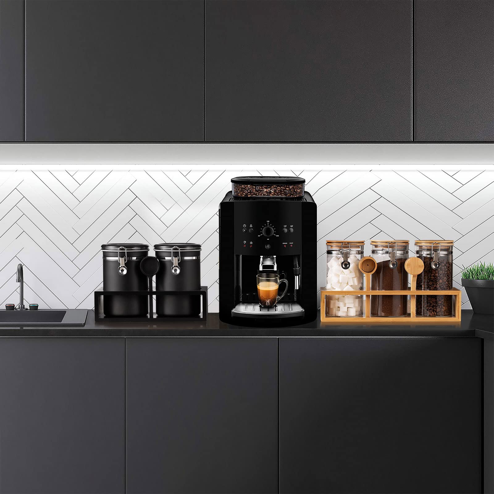 Durable black stainless steel jars blend with any kitchen decor.