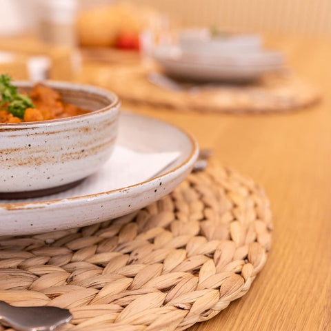 YANGQIHOME boho wicker placemats in natural tones complement rustic decor