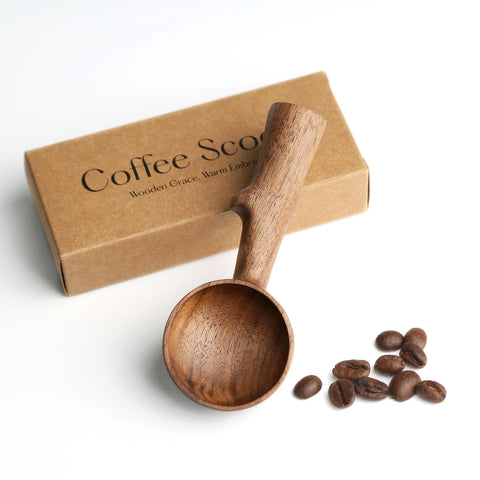 YANISM walnut coffee scoop with branch-handle showing natural wood grain for precise measurements