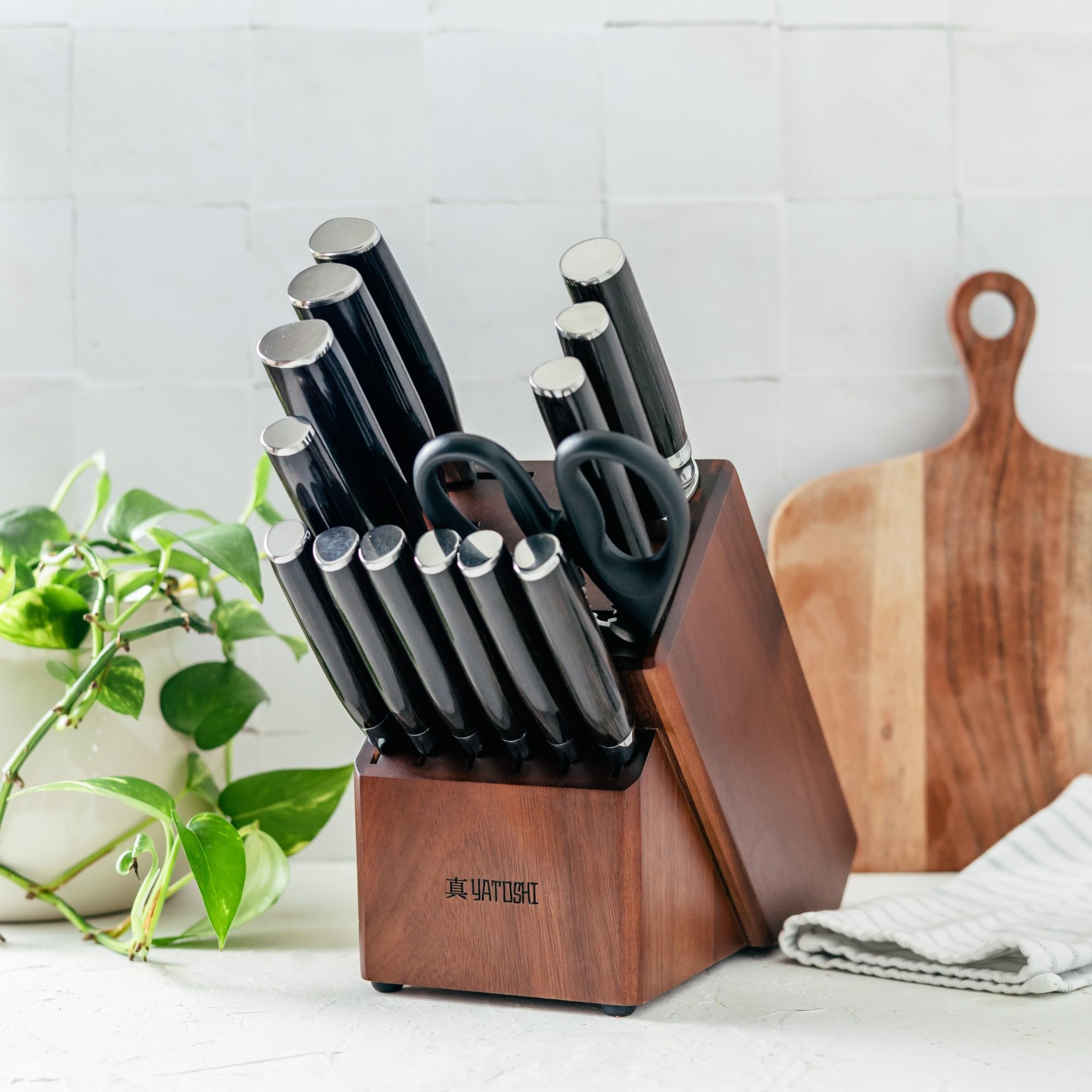Yatoshi Knives pakkawood handle detail highlighting ergonomic balance and control
