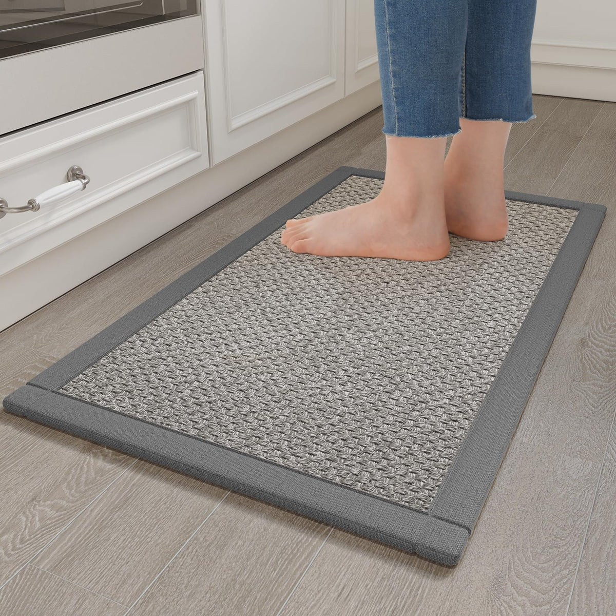 YDKGL soft cushioning kitchen rug provides comfortable standing support during long cooking sessions.