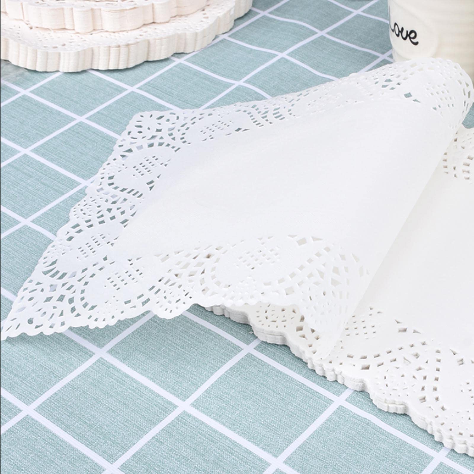 YESON disposable greaseproof doilies pack 100 for quick cleanup after meals.