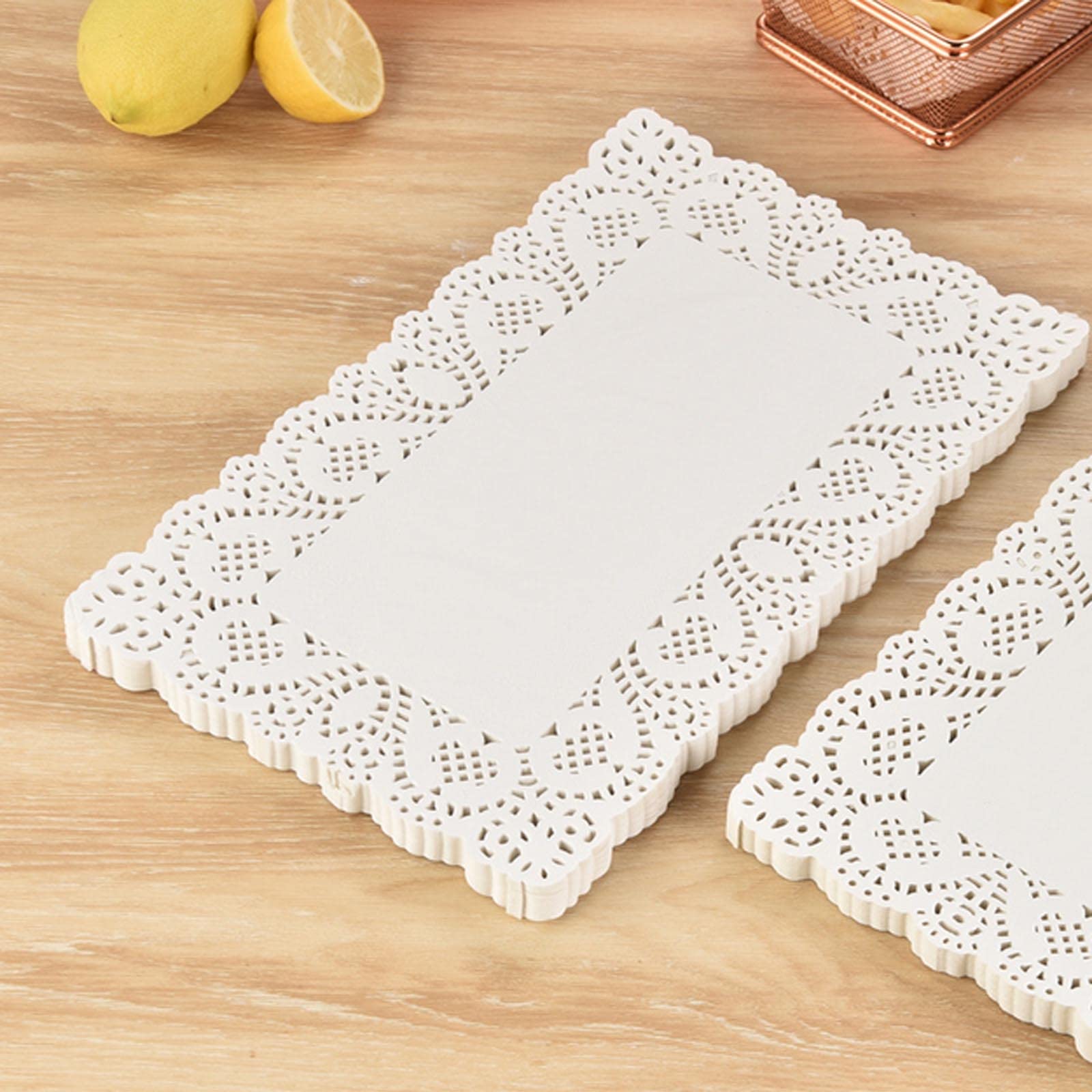 YESON lace paper doilies 12x16 plate liner enhances dessert presentation and protects surfaces.