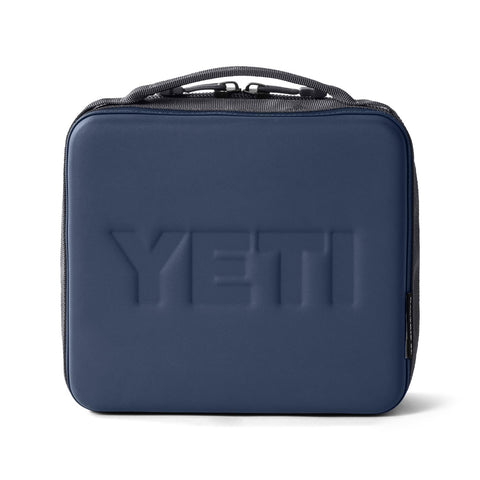 YETI Daytrip 3L navy bag resting on bench, highlighting portable lunch protection