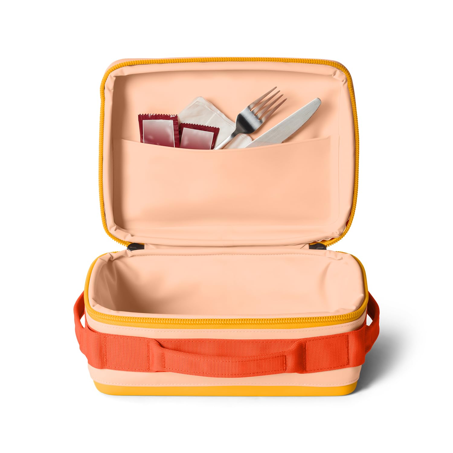 YETI Daytrip 5L weather-resistant shell protects contents outdoors.