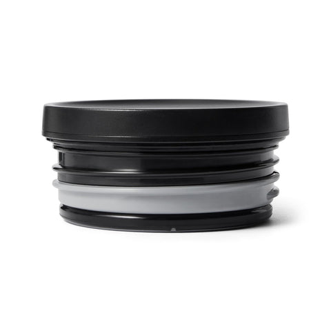 YETI Rambler 16 oz Food Jar beside a packed backpack at camp