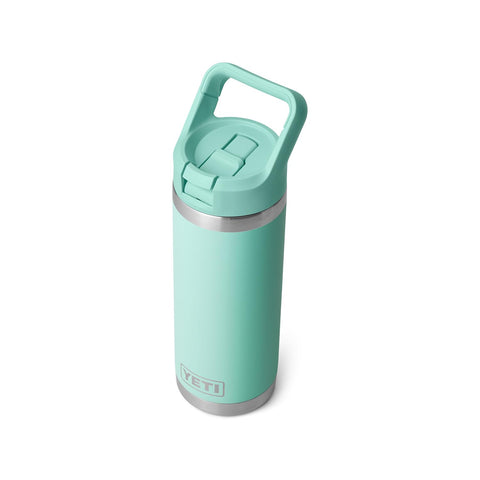 YETI Rambler 18oz bottle on trail ready for outdoor hydration in seafoam.