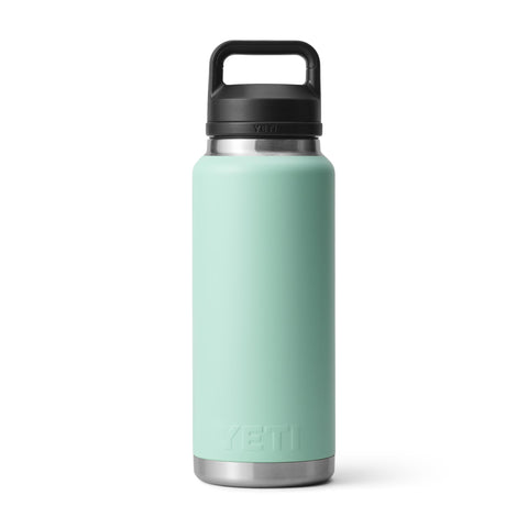 YETI Rambler 36 oz bottle on outdoor hike for reliable hydration.