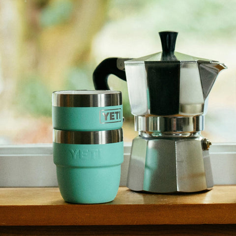 Camp kitchen use with YETI Rambler 4 oz cup supports outdoor coffee rituals.