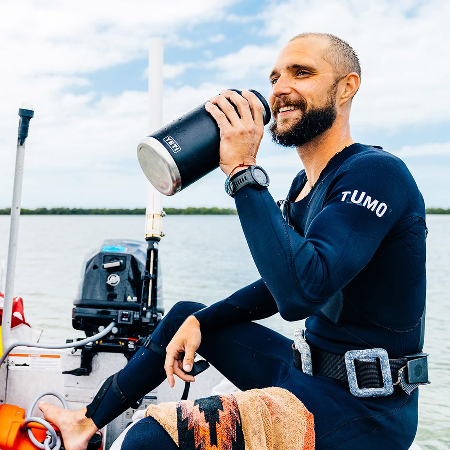 YETI Rambler 64 oz bottle, triple haul handle, easy carrying on long trips.